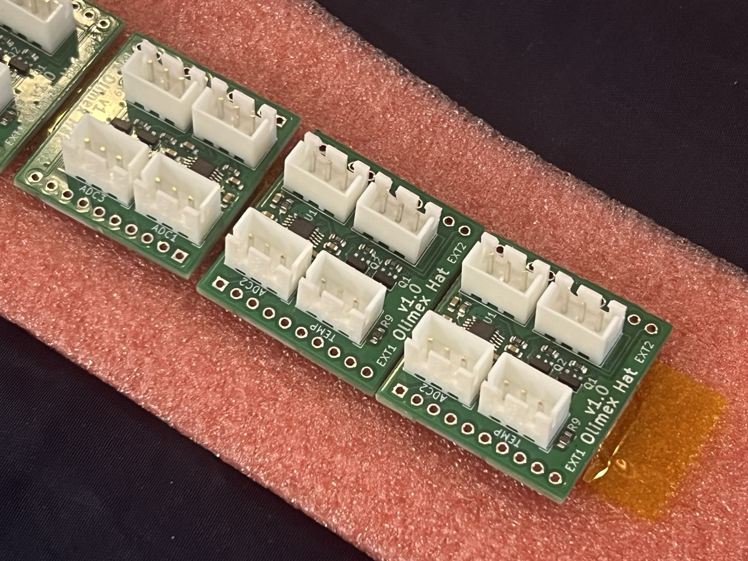 Custom designed Olimex ESP32 hat with 4 JST-XH connectors for connecting up to 3 analog sensors and a OneWire bus for our DS18B20 temperature sensor.